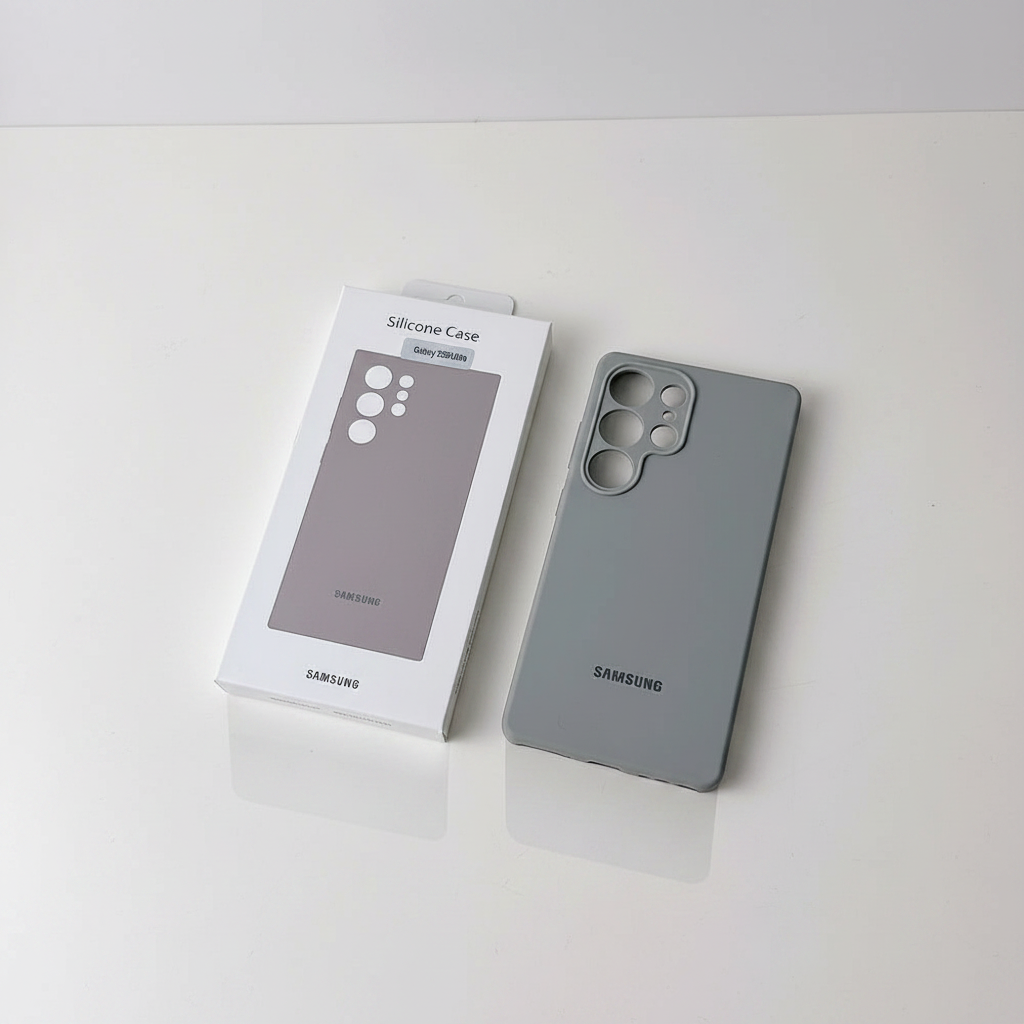 Gray silicone phone case with packaging on a white background